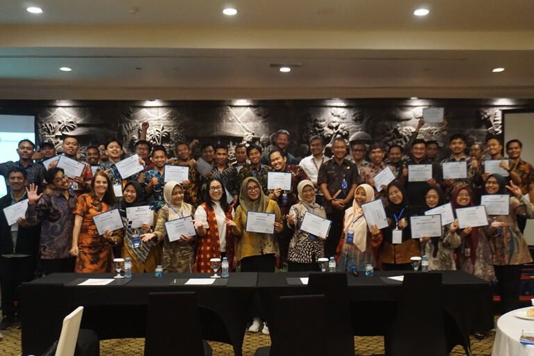 WE are Water Education Indonesia Project workshop group photo with participants holding certificates